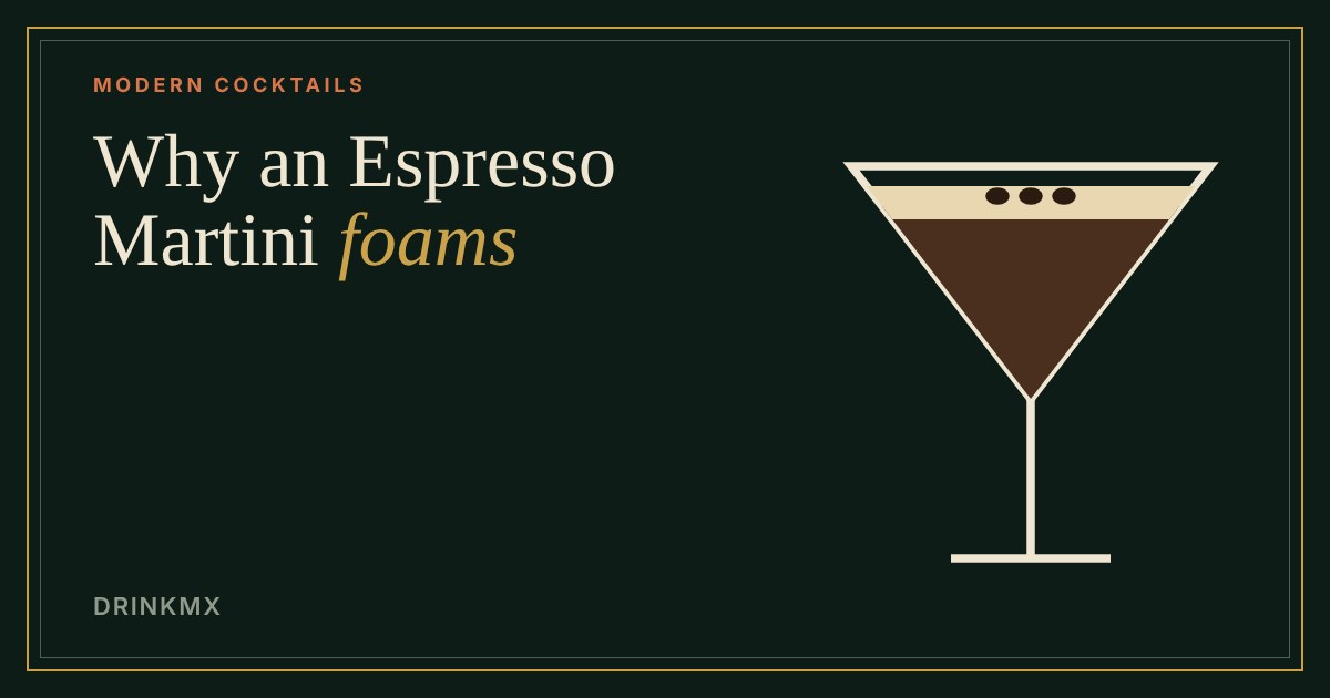 A cocktail glass of dark espresso martini topped with pale foam and three coffee beans